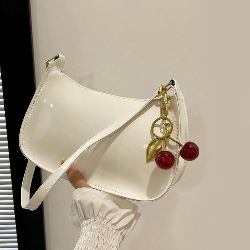 TrenLux Wear Women's PU Leather Solid Colour Cherry Pendant Casual Underarm Shoulder Bag