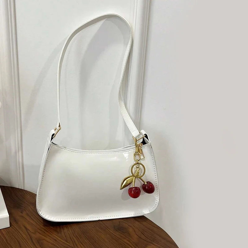 TrenLux Wear Women's PU Leather Solid Colour Cherry Pendant Casual Underarm Shoulder Bag