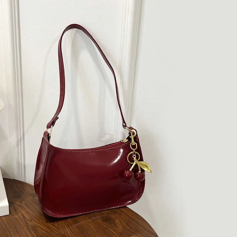 TrenLux Wear Women's PU Leather Solid Colour Cherry Pendant Casual Underarm Shoulder Bag