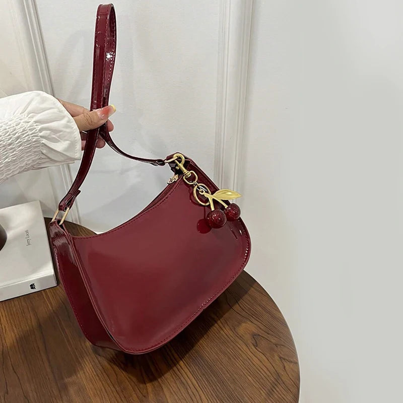 TrenLux Wear Women's PU Leather Solid Colour Cherry Pendant Casual Underarm Shoulder Bag
